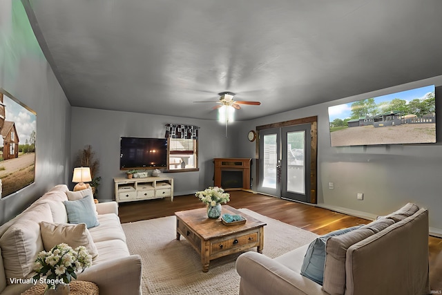 2526 S Airport Rd, Monticello, IN 47960 - living room with wood finished floors, french doors, ceiling fan, and baseboards