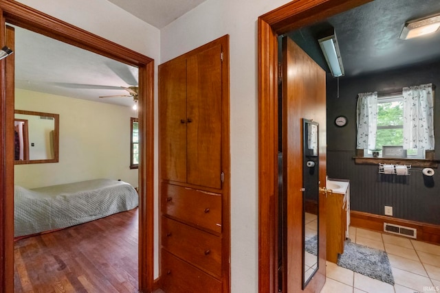 2526 S Airport Rd, Monticello, IN 47960 - corridor with baseboards and light tile patterned floors