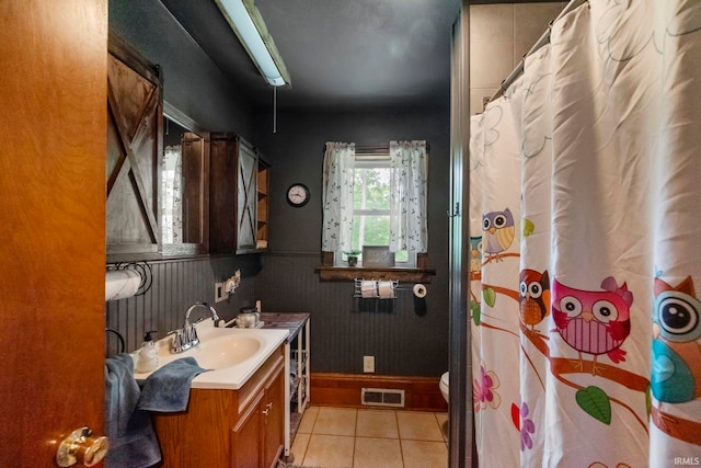 2526 S Airport Rd, Monticello, IN 47960 - full bathroom with vanity, tile patterned floors, toilet, and a shower with curtain