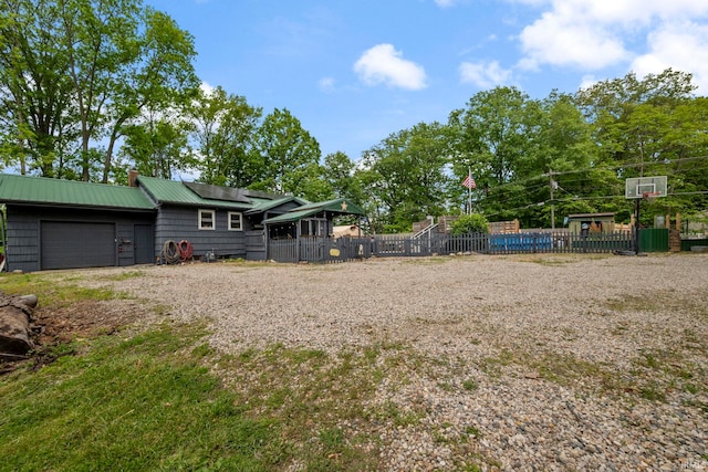 2526 S Airport Rd, Monticello, IN 47960 - fenced yard with a garage