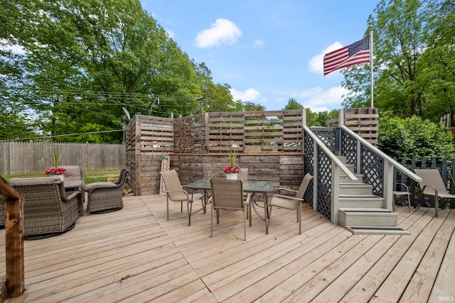 2526 S Airport Rd, Monticello, IN 47960 - wooden deck with outdoor dining space and stairs