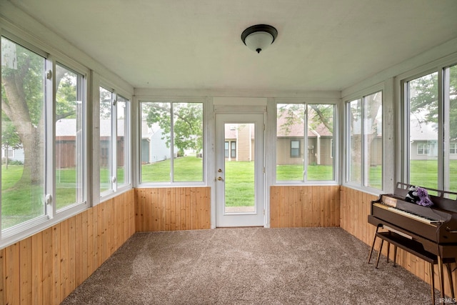 511 Westview Cir, West Lafayette, IN 47906 - sunroom featuring wood walls, healthy amount of natural light, and carpet