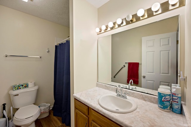 511 Westview Cir, West Lafayette, IN 47906 - full bath with vanity, toilet, wood finished floors, and a shower with curtain