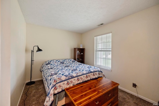 511 Westview Cir, West Lafayette, IN 47906 - bedroom featuring carpet floors, baseboards, and a textured ceiling