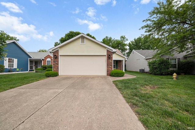 511 Westview Cir, West Lafayette, IN 47906 - ranch-style house featuring brick siding, an attached garage, concrete driveway, and a front lawn
