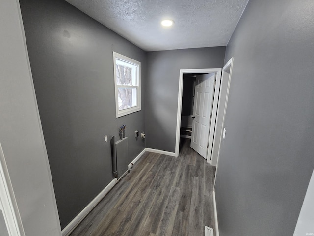 2914 Marian Ave, Lafayette, IN 47905 - corridor featuring a textured ceiling, dark wood-type flooring, and baseboards