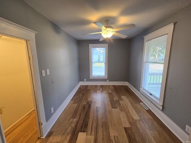900 S 28th St, Lafayette, IN 47904 - spare room with healthy amount of natural light, ceiling fan, and dark wood-style floors