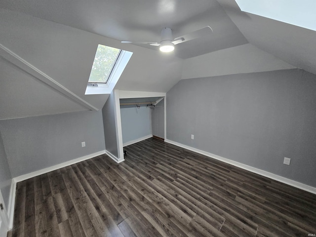 900 S 28th St, Lafayette, IN 47904 - bonus room featuring a skylight, dark wood-style floors, baseboards, vaulted ceiling, and ceiling fan