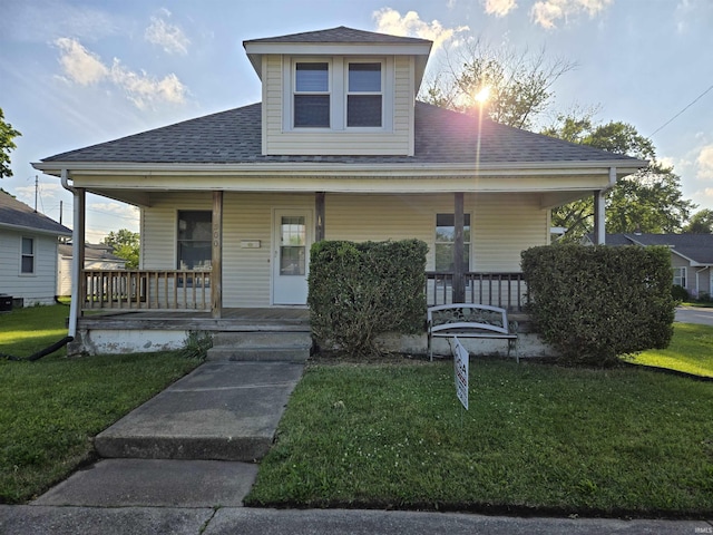 900 S 28th St, Lafayette, IN 47904 - bungalow-style house with covered porch, a front yard, and roof with shingles