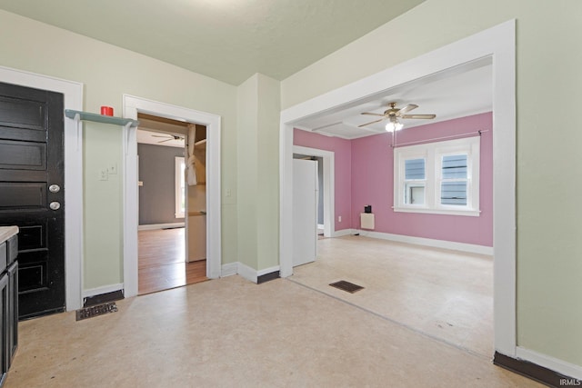3422 S Calhoun St, Fort Wayne, IN 46807 - unfurnished living room featuring a ceiling fan and baseboards