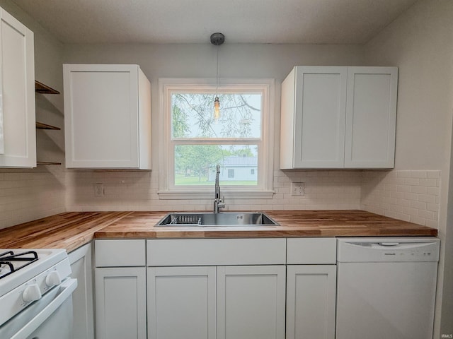 2425 Ojibway Trl, Fort Wayne, IN 46809 - kitchen with butcher block countertops, white appliances, a sink, open shelves, and decorative backsplash