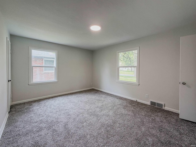 2425 Ojibway Trl, Fort Wayne, IN 46809 - carpeted spare room featuring healthy amount of natural light and baseboards