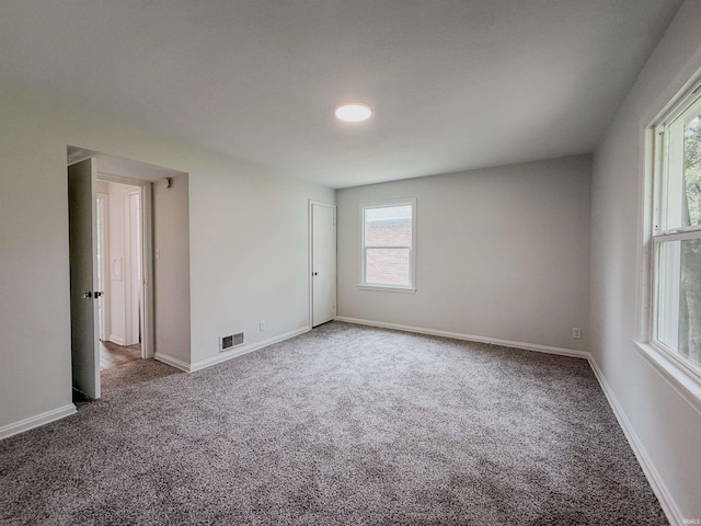 2425 Ojibway Trl, Fort Wayne, IN 46809 - spare room featuring carpet and baseboards