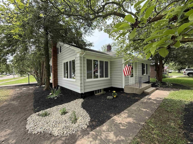 2425 Ojibway Trl, Fort Wayne, IN 46809 - view of side of property featuring a chimney