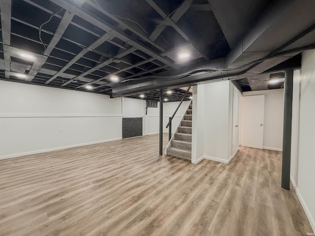 2425 Ojibway Trl, Fort Wayne, IN 46809 - finished below grade area with wood finished floors, stairway, and baseboards