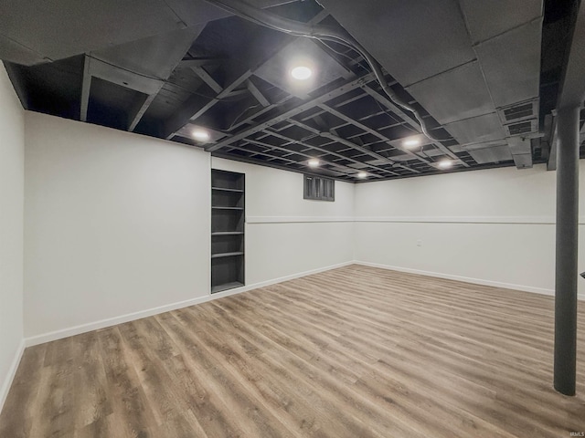 2425 Ojibway Trl, Fort Wayne, IN 46809 - finished basement with wood finished floors and baseboards