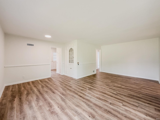 2425 Ojibway Trl, Fort Wayne, IN 46809 - unfurnished room with wood finished floors, baseboards, and recessed lighting
