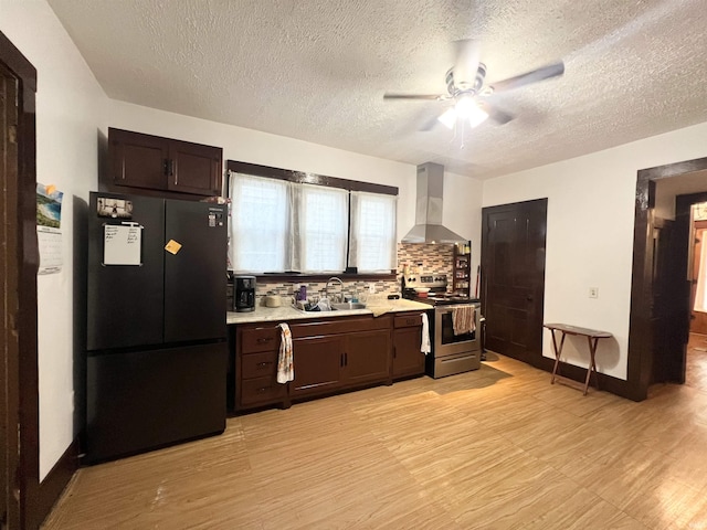 400 Burlington Ave, Logansport, IN 46947 - kitchen with freestanding refrigerator, extractor fan, stainless steel electric range oven, a ceiling fan, and a sink
