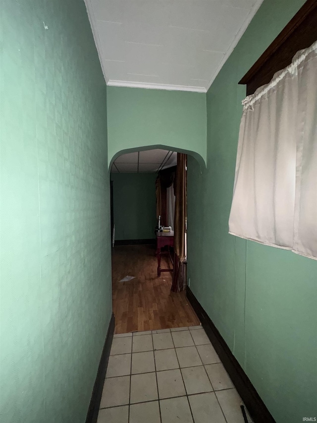 457 E Leith St, Fort Wayne, IN 46806 - hallway with arched walkways, crown molding, wood finished floors, and baseboards