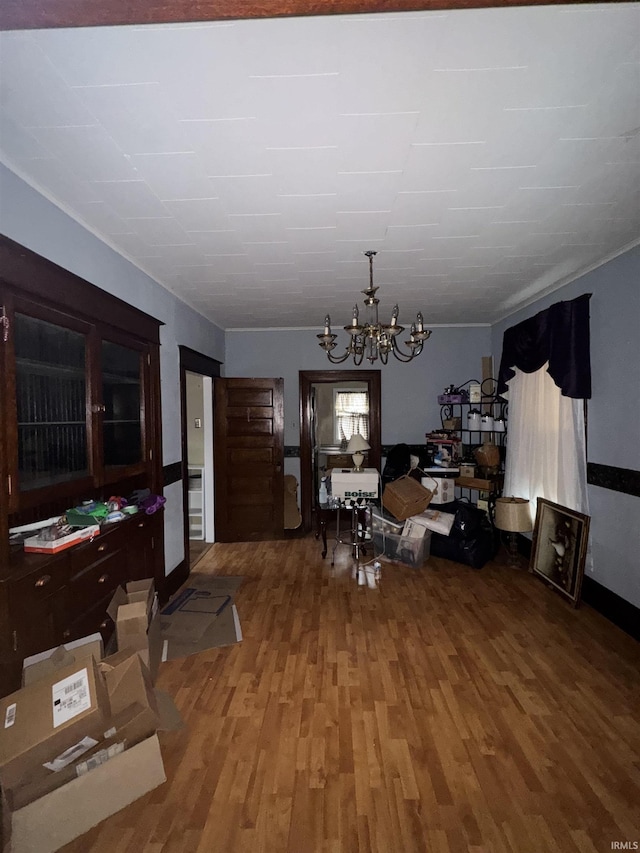 457 E Leith St, Fort Wayne, IN 46806 - dining space featuring a chandelier and wood finished floors