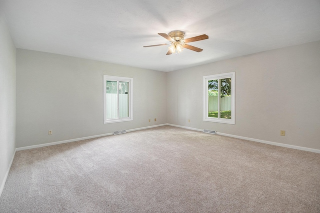 4624 3b Rd, Bremen, IN 46506 - unfurnished room featuring a ceiling fan, light carpet, and baseboards