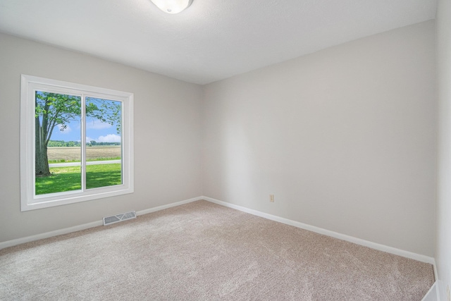 4624 3b Rd, Bremen, IN 46506 - spare room featuring carpet and baseboards