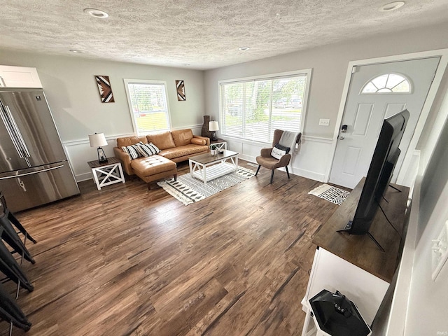 3833 Clover Dr, Newburgh, IN 47630 - living room featuring a textured ceiling, dark wood-type flooring, and recessed lighting
