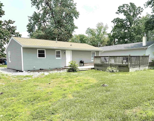 3833 Clover Dr, Newburgh, IN 47630 - back of house featuring a deck and a yard