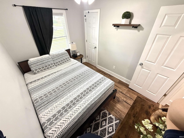 3833 Clover Dr, Newburgh, IN 47630 - bedroom featuring wood finished floors and baseboards