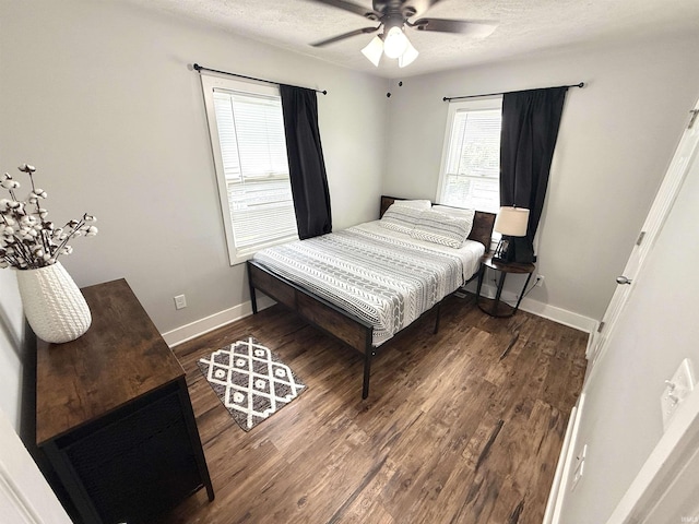 3833 Clover Dr, Newburgh, IN 47630 - bedroom with wood finished floors, baseboards, a textured ceiling, and ceiling fan