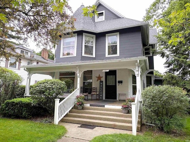 411 S 6th St, Goshen, IN 46526 - view of front of property featuring a porch and a shingled roof