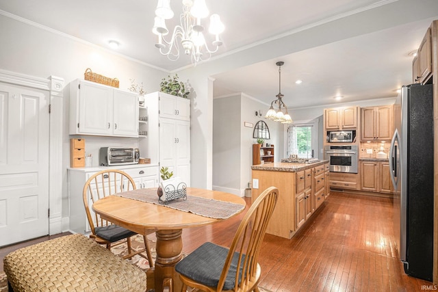 411 S 6th St, Goshen, IN 46526 - dining room featuring a chandelier, hardwood / wood-style flooring, ornamental molding, baseboards, and recessed lighting