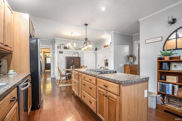 411 S 6th St, Goshen, IN 46526 - kitchen with appliances with stainless steel finishes, a chandelier, dark wood-type flooring, ornamental molding, and a kitchen island
