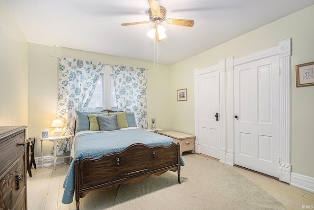 411 S 6th St, Goshen, IN 46526 - bedroom featuring light wood-style floors, baseboards, and ceiling fan