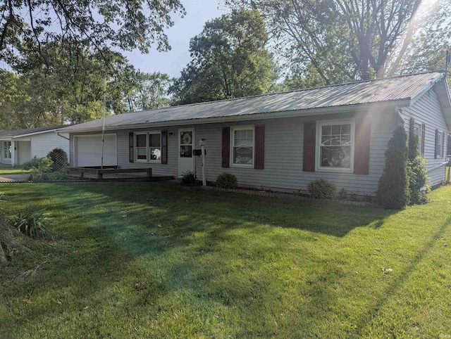 417 S Linn Grove Ave, Berne, IN 46711 - ranch-style house featuring a front lawn and metal roof