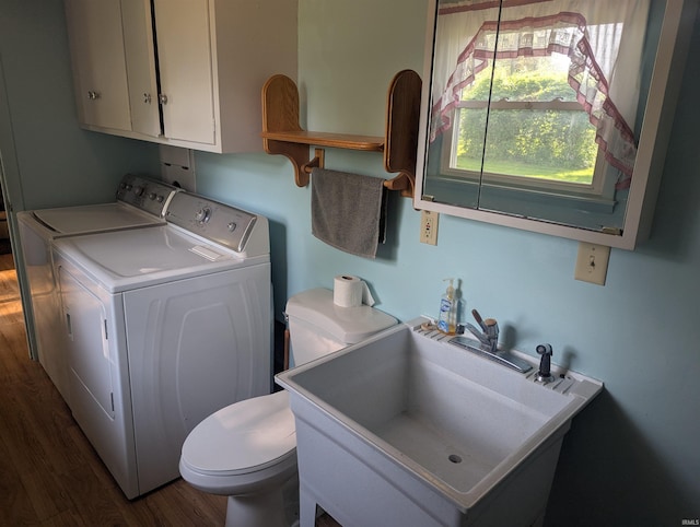 417 S Linn Grove Ave, Berne, IN 46711 - washroom with washing machine and dryer and wood finished floors