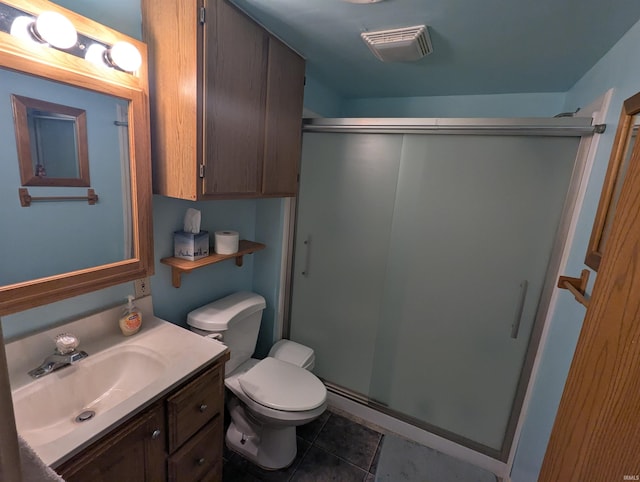 417 S Linn Grove Ave, Berne, IN 46711 - full bathroom with a shower stall, vanity, toilet, and tile patterned floors