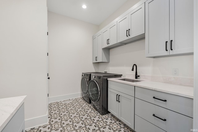 121 Jadis Ct, Fort Wayne, IN 46845 - laundry room featuring washing machine and dryer, cabinet space, baseboards, and recessed lighting