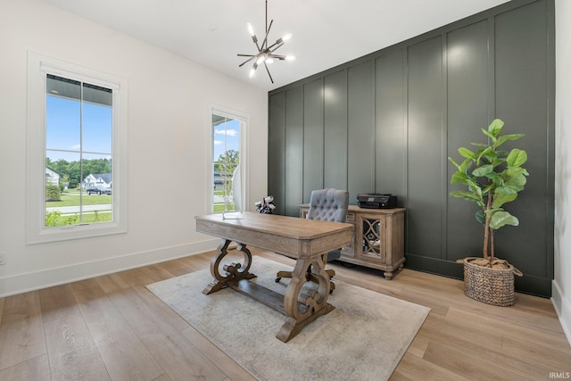 121 Jadis Ct, Fort Wayne, IN 46845 - office space with healthy amount of natural light, a chandelier, baseboards, and light wood finished floors