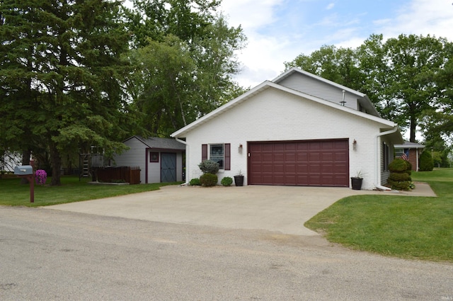 12018 N Woodland Acres Dr, Syracuse, IN 46567 - view of front of property featuring an attached garage, a front lawn, and driveway
