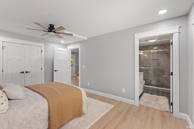 633 S Ravencrest Ave, Bloomington, IN 47401 - bedroom with light wood-style floors, baseboards, ensuite bathroom, recessed lighting, and a ceiling fan