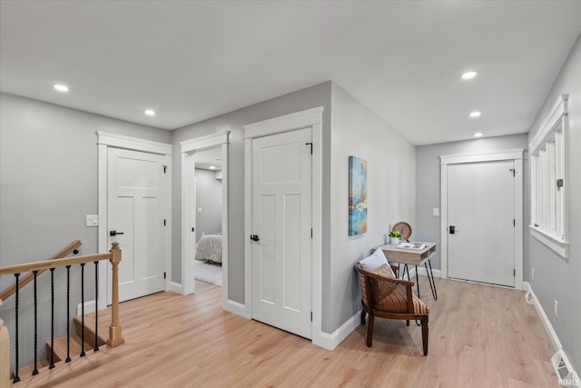 633 S Ravencrest Ave, Bloomington, IN 47401 - entryway with light wood-style flooring, recessed lighting, and baseboards