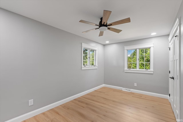 633 S Ravencrest Ave, Bloomington, IN 47401 - unfurnished bedroom with baseboards, light wood finished floors, recessed lighting, and a ceiling fan