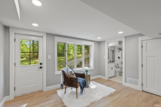 633 S Ravencrest Ave, Bloomington, IN 47401 - sitting room featuring light wood finished floors, baseboards, and recessed lighting