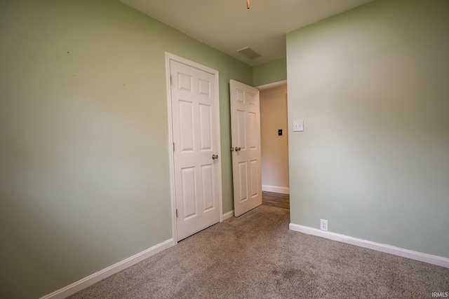 113 W Berkeley Ave, Evansville, IN 47710 - unfurnished bedroom featuring carpet floors and baseboards