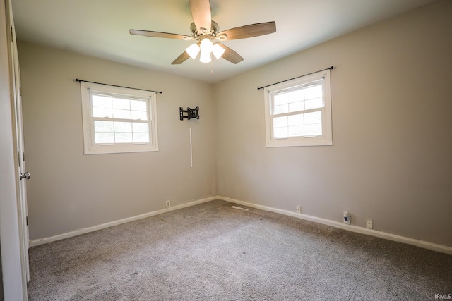 113 W Berkeley Ave, Evansville, IN 47710 - spare room with plenty of natural light, a ceiling fan, carpet, and baseboards
