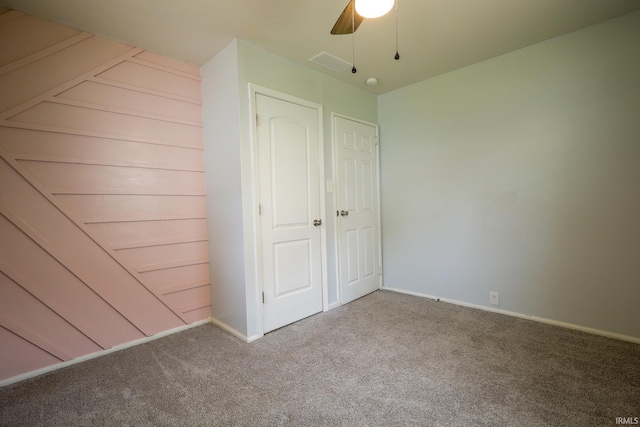 113 W Berkeley Ave, Evansville, IN 47710 - unfurnished bedroom featuring carpet floors, baseboards, and a ceiling fan