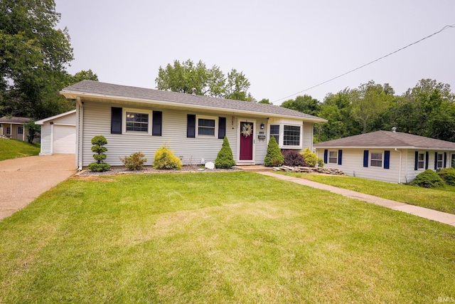 113 W Berkeley Ave, Evansville, IN 47710 - ranch-style home with a front yard, an outdoor structure, and a detached garage
