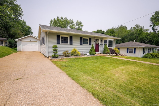 113 W Berkeley Ave, Evansville, IN 47710 - view of front facade featuring an outbuilding, a garage, concrete driveway, and a front lawn