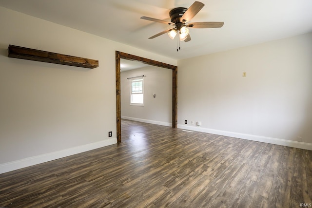 113 W Berkeley Ave, Evansville, IN 47710 - unfurnished room with dark wood finished floors, ceiling fan, and baseboards